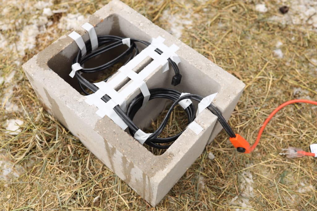 heated cable inside concrete block for chicken waterer