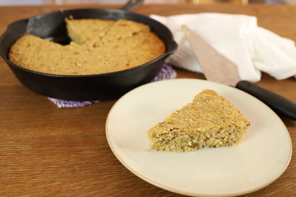 slice of cornbread taken out of pan