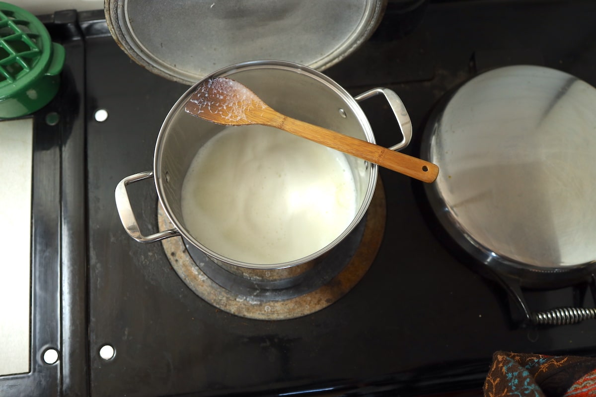 milk frothing up after adding baking soda