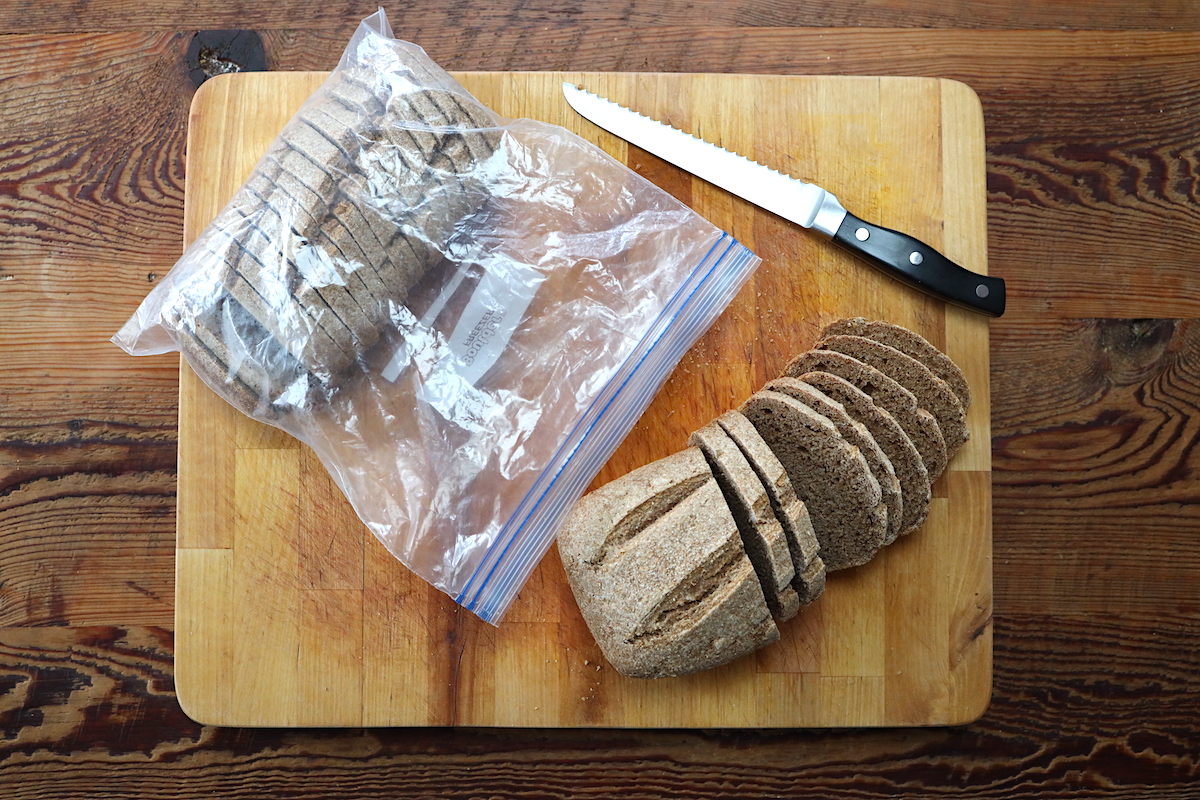 sliced sourdough bread in freezer bag ready to freeze