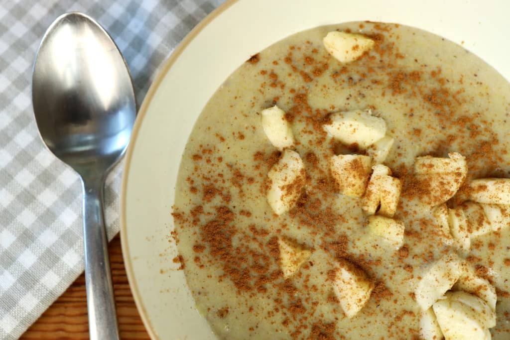bowl of cornmeal porridge with cinnamon