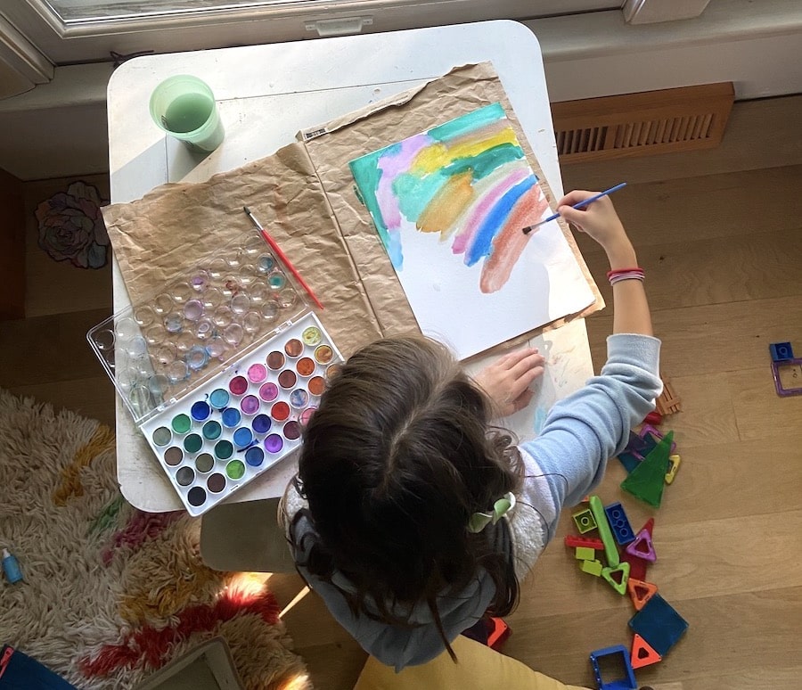 child painting and making art