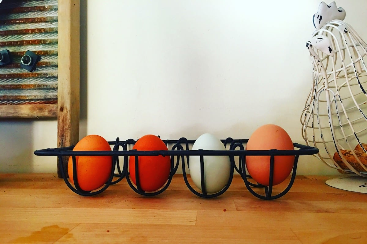 fresh eggs sitting on countertop