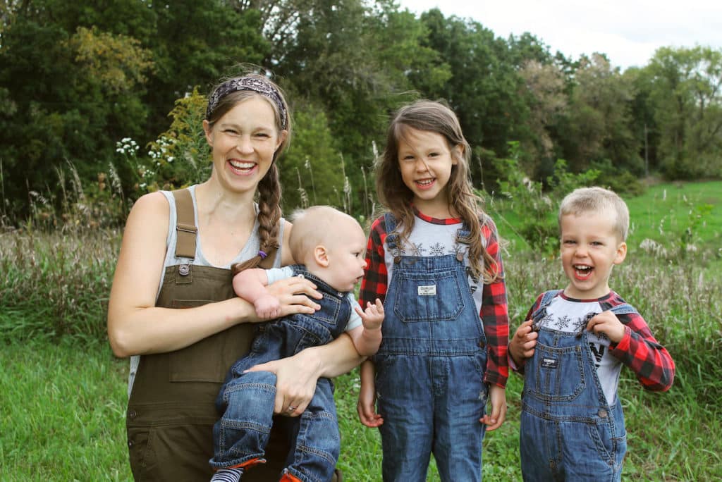 smiling homestead family in overalls