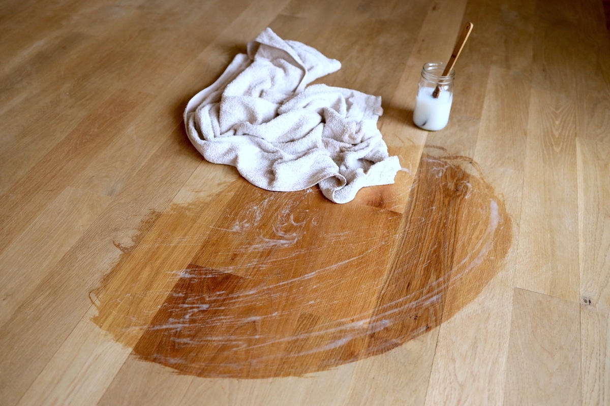spreading wood soap finish on white oak floors