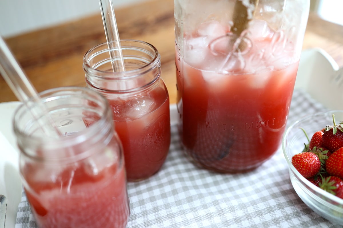 ice cold glass of homemade strawberry lemonade