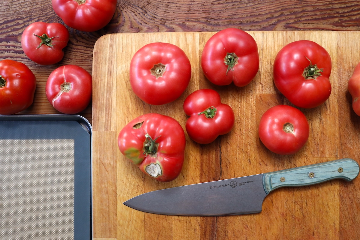 garden tomatoes on cutting board for no peel tomato sauce