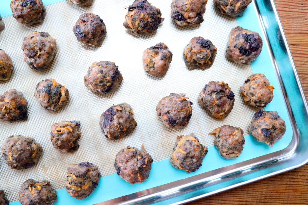 breakfast meatballs on cookie sheet to freeze