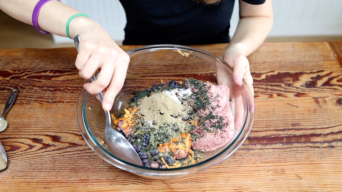 mixing breakfast meatball ingredients