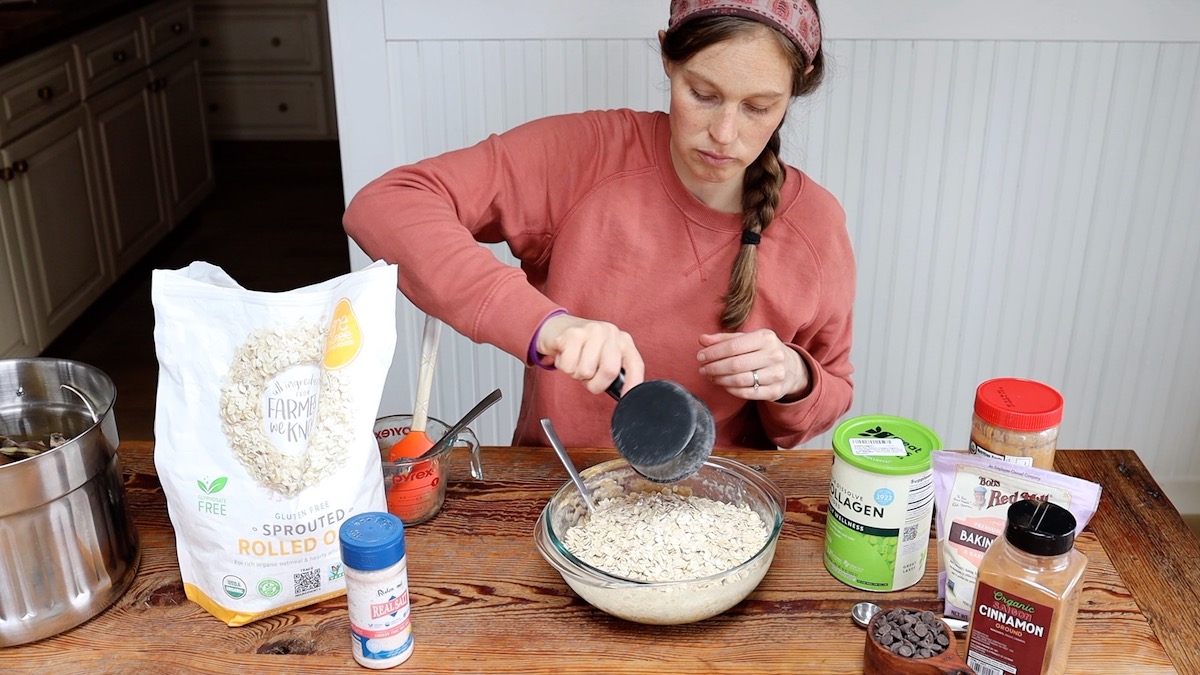 adding oats to peanut butter banana oat bars