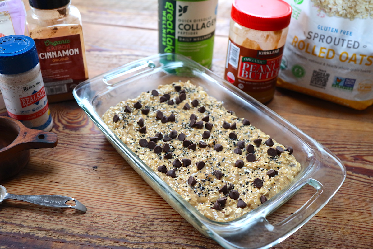 peanut butter banana oat bar batter in baking dish