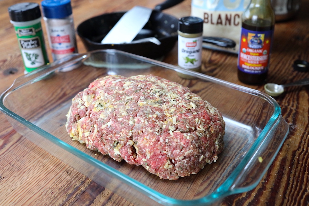 uncooked meatloaf in baking dish