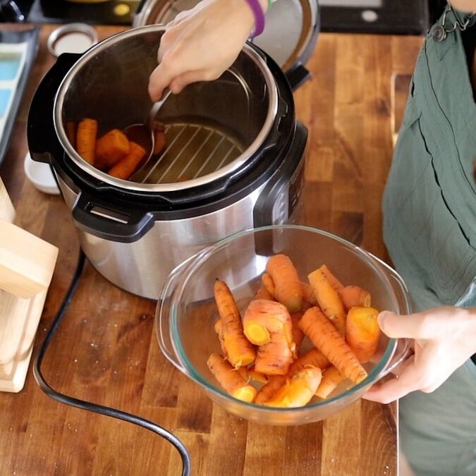 scooping carrots out of instant pot