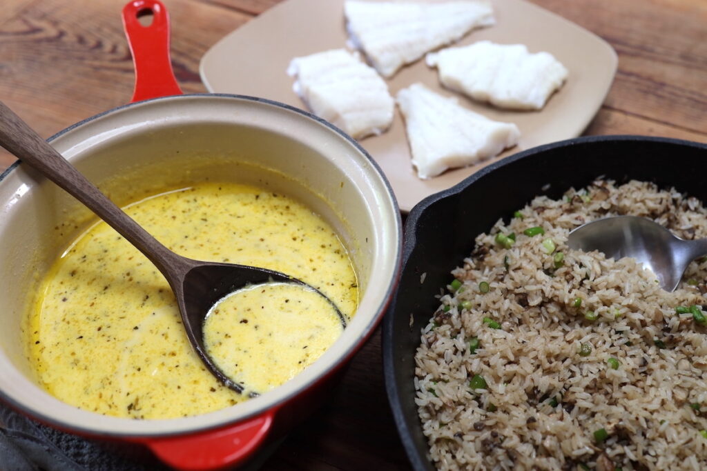 homemade cream sauce with fish and rice