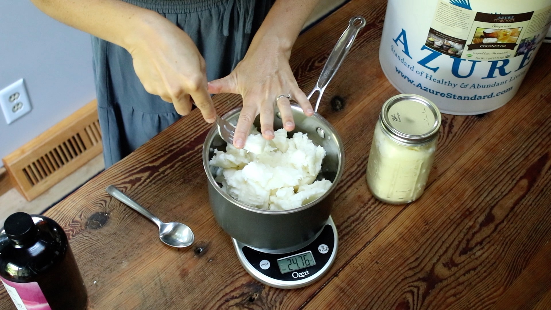 weighing coconut oil for dish soap bars