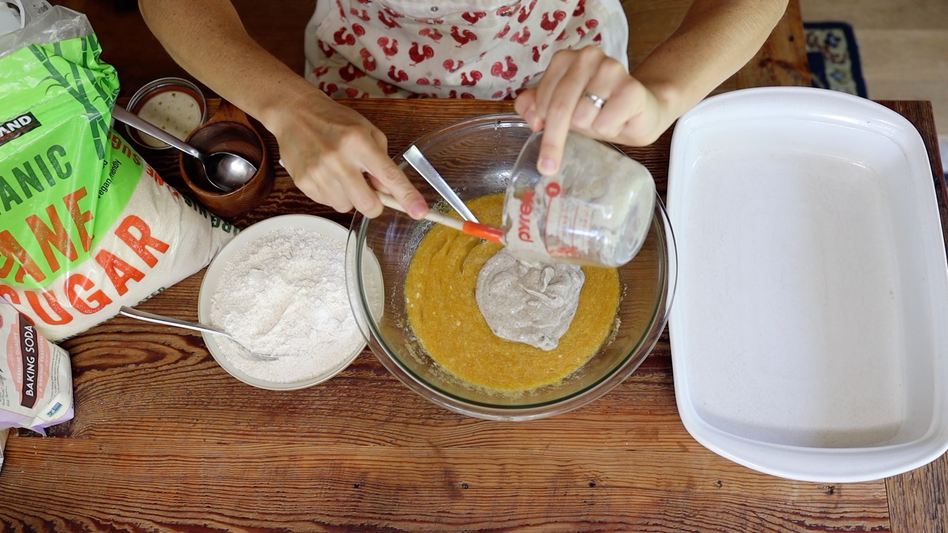 adding sourdough starter to cookie bar batter