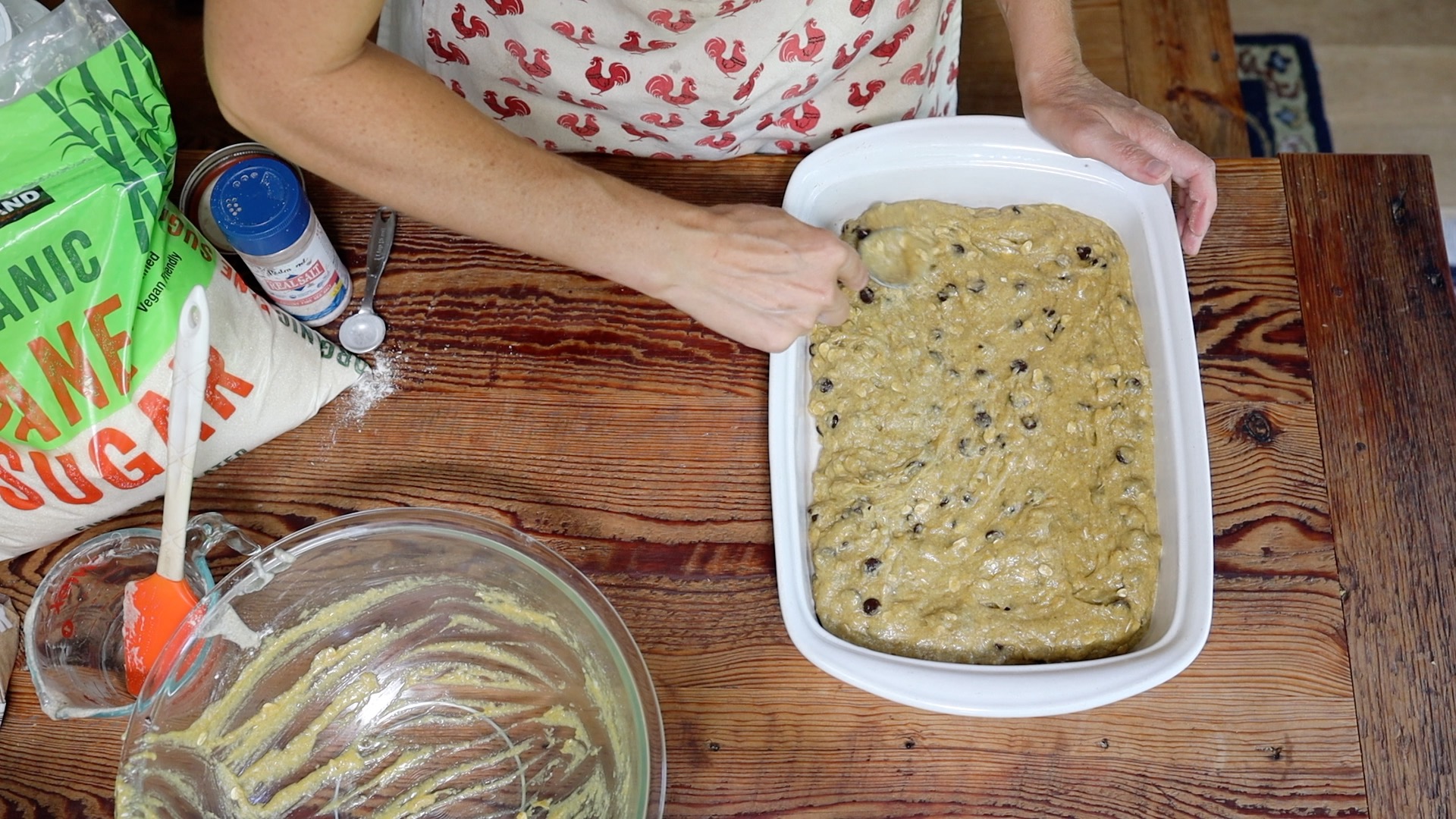 spreading cookie dough in pan