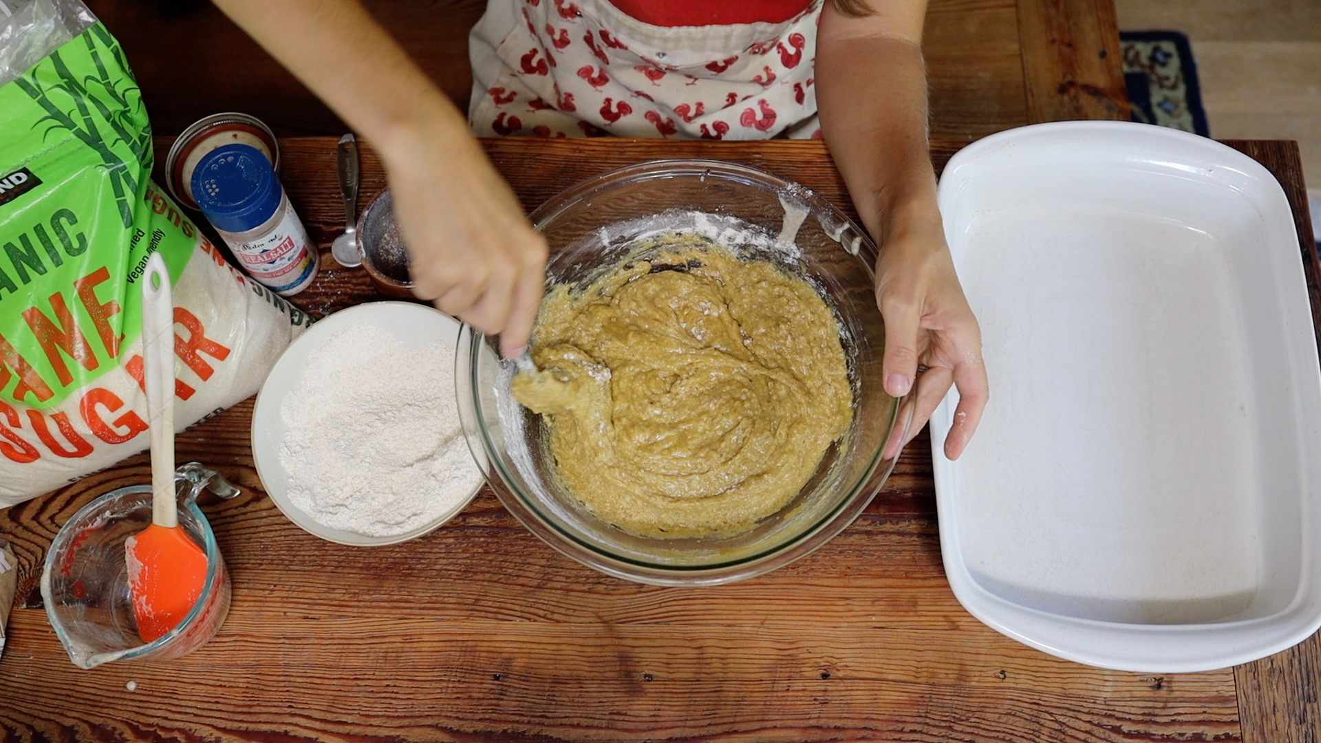 stirring sourdough cookie bar batter