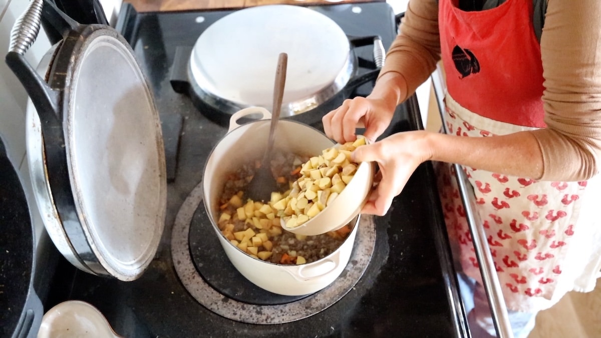 adding diced potatoes