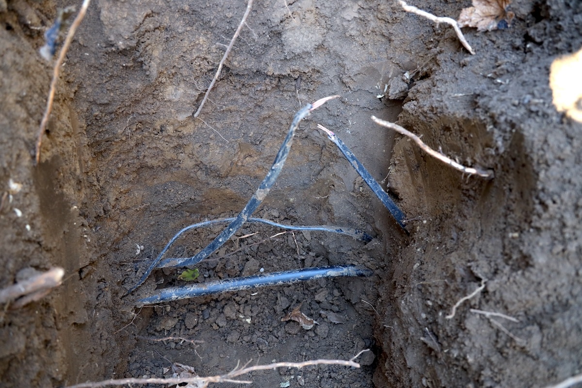 digging up existing underground waterline