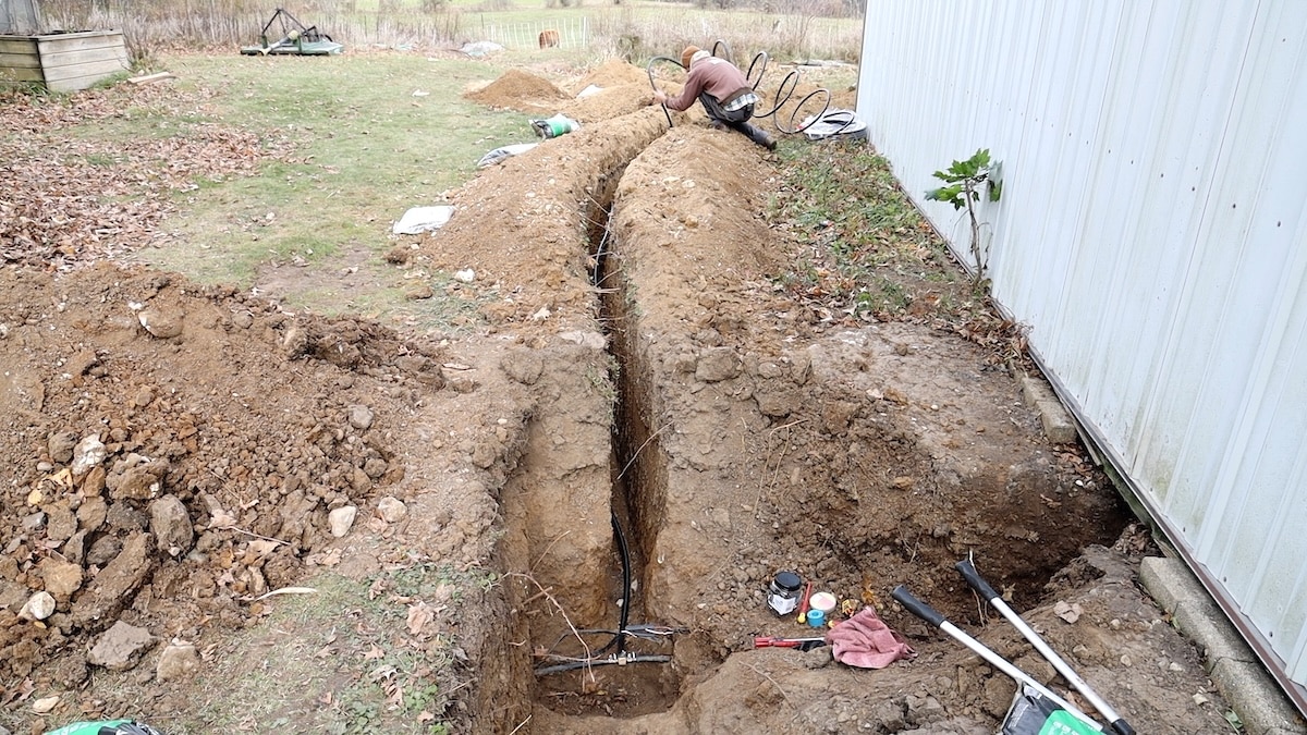 laying waterline in trench