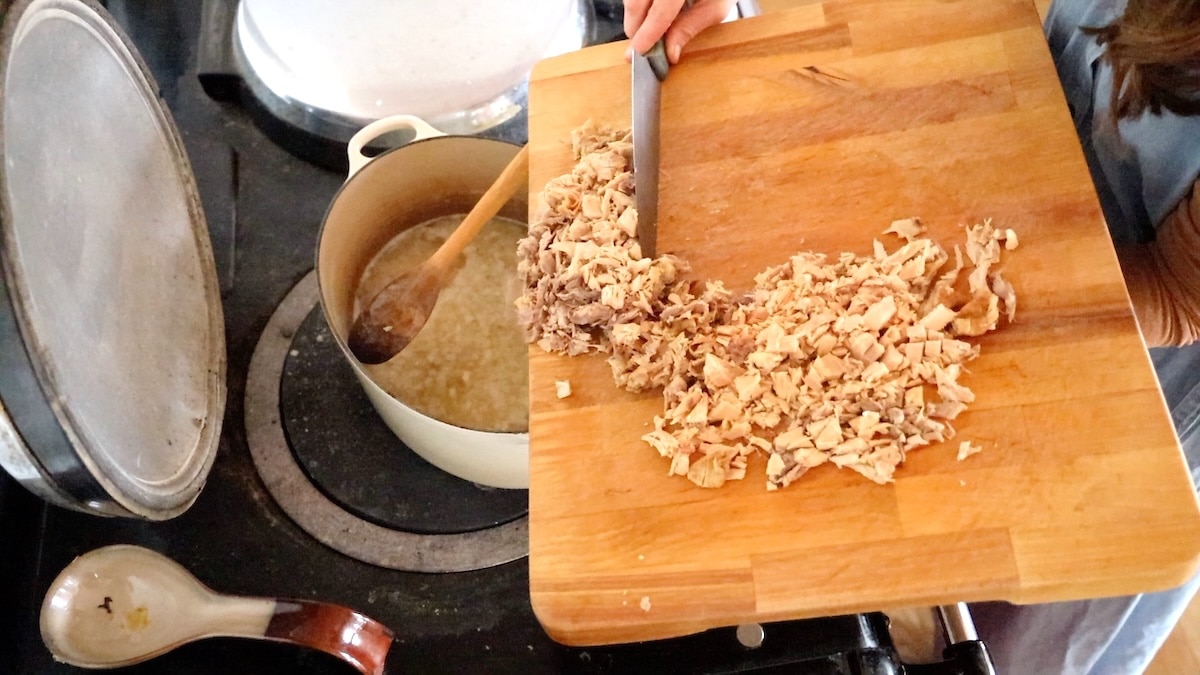 adding cooked chicken