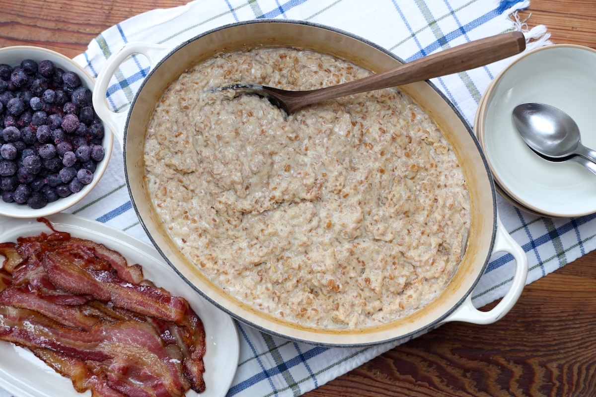 spelt porridge served with blueberries and bacon