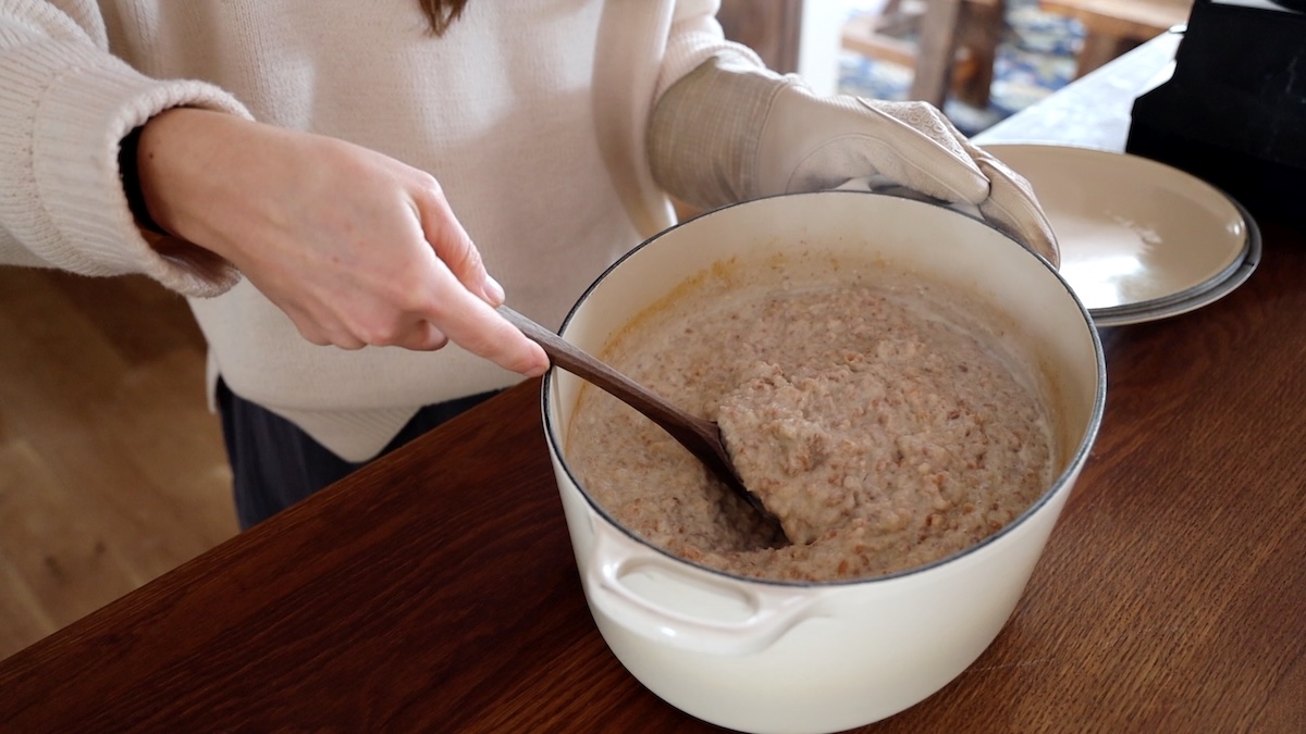 stirring pot of spelt porridge