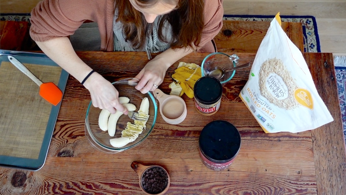 mashing bananas in bowl