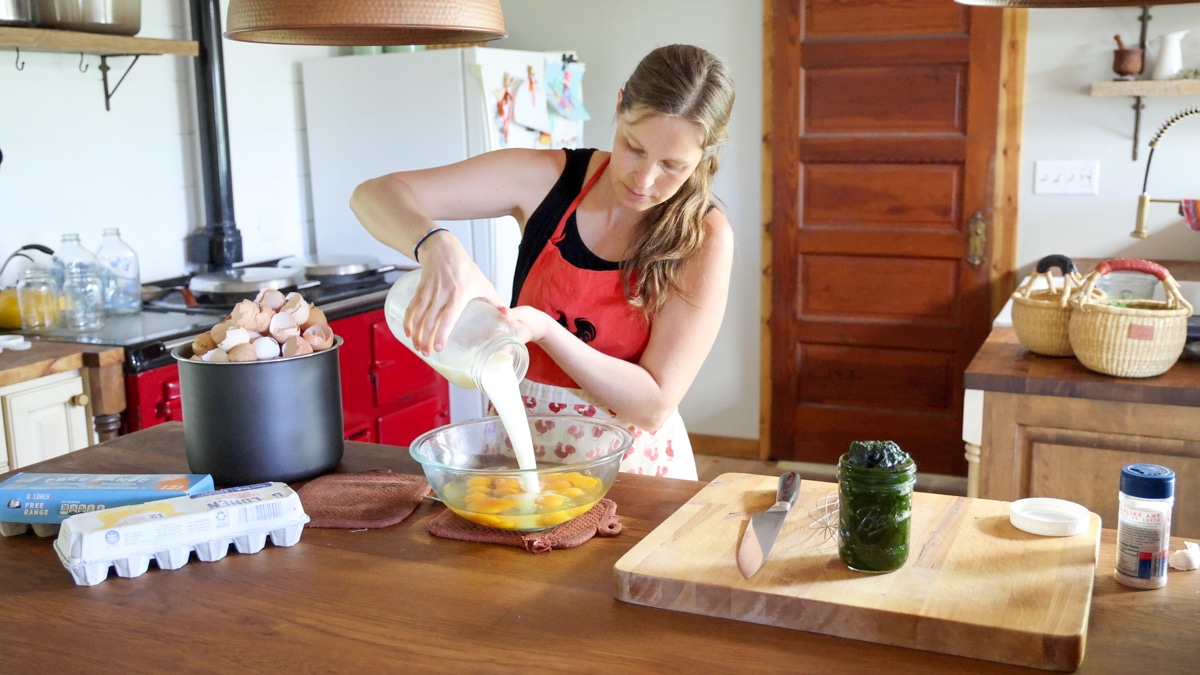 adding milk for savory dutch baby