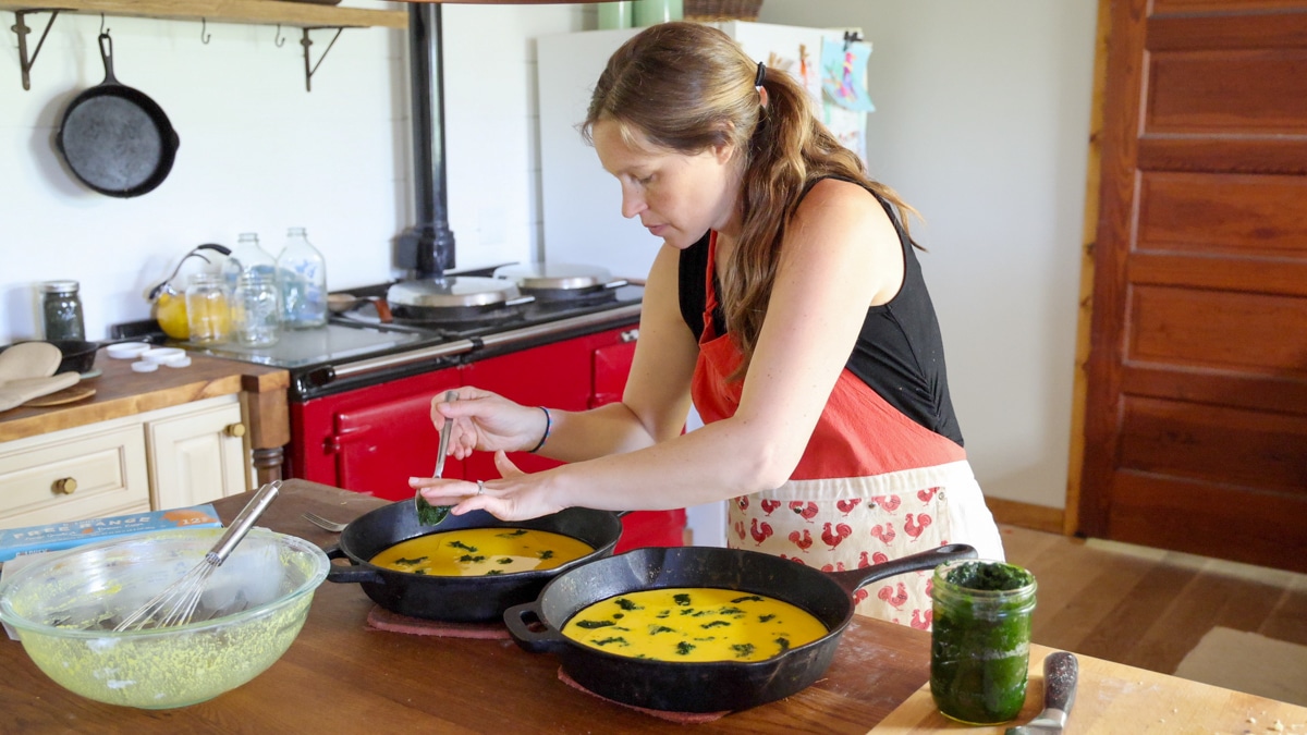 adding pesto to uncooked batter