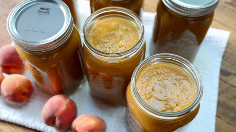 peach sauce in mason jars