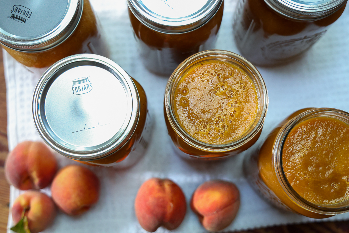 simple peach sauce in jars