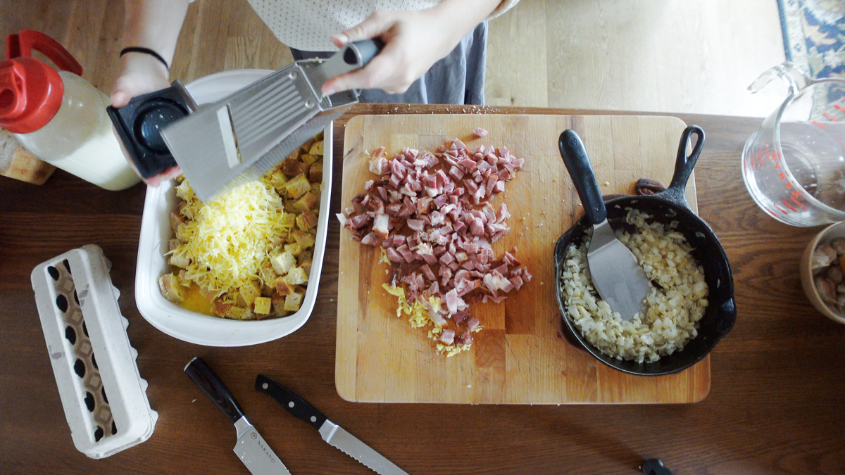 adding shredded cheese