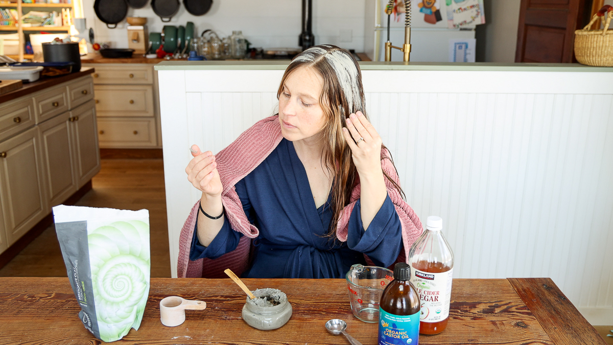 applying homemade hair mask to hair