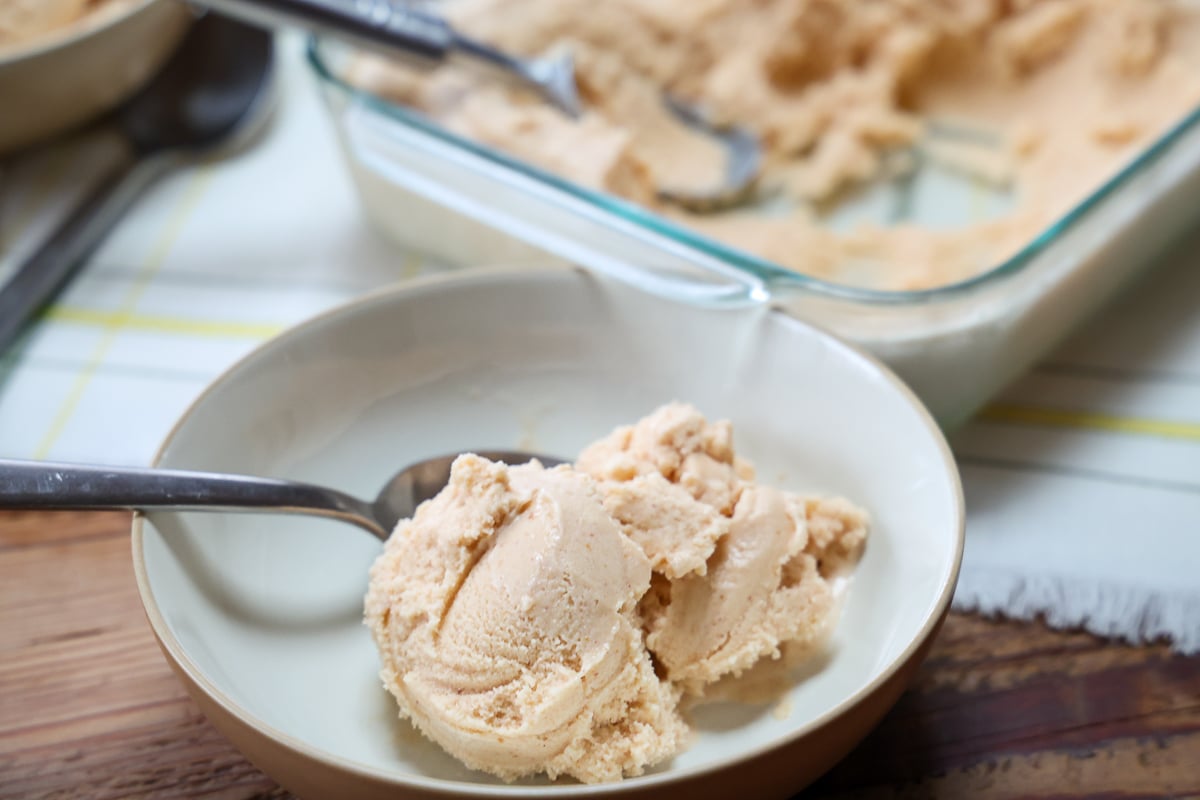 peach ice cream with fresh or frozen peaches