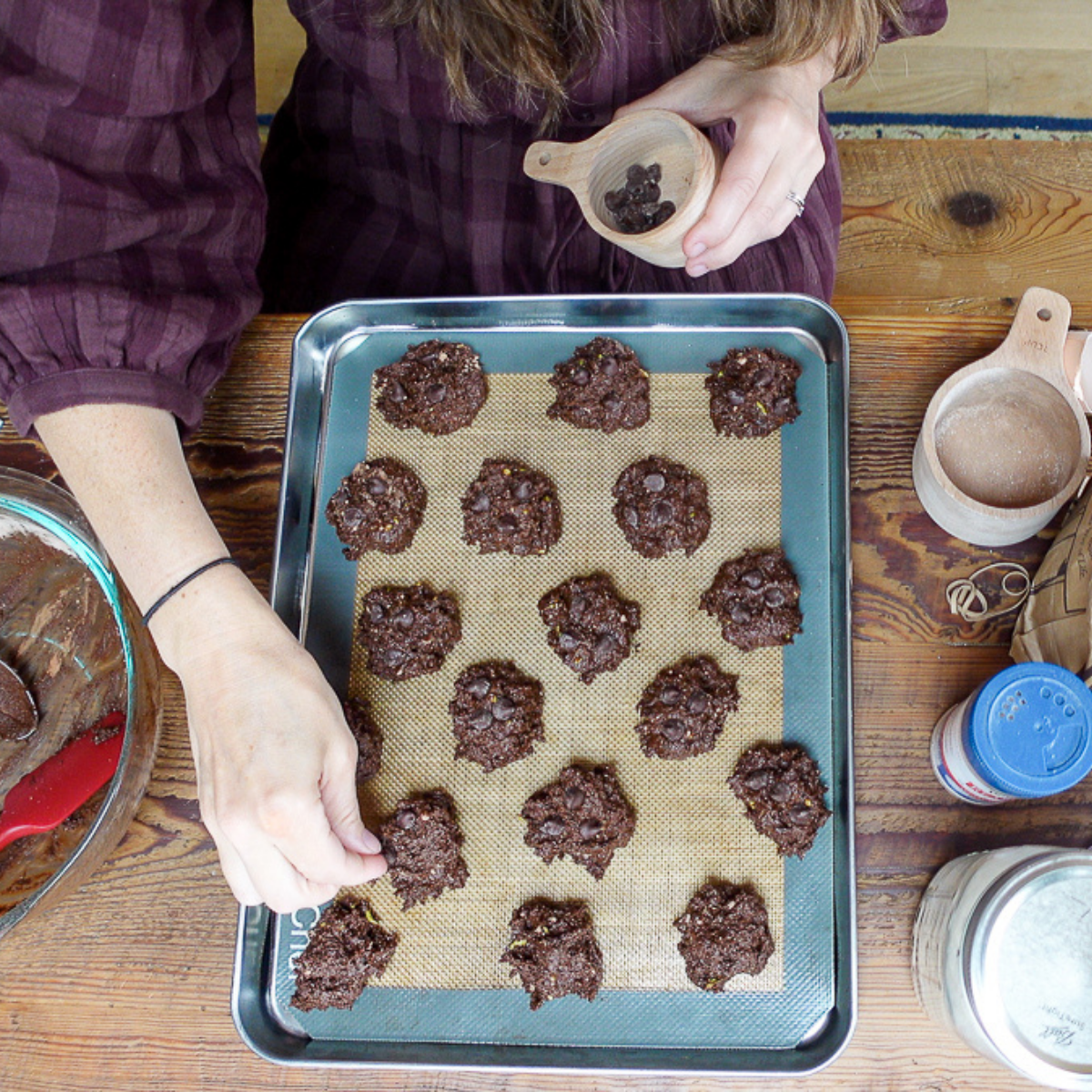 adding chocolate chips to avocado cookies
