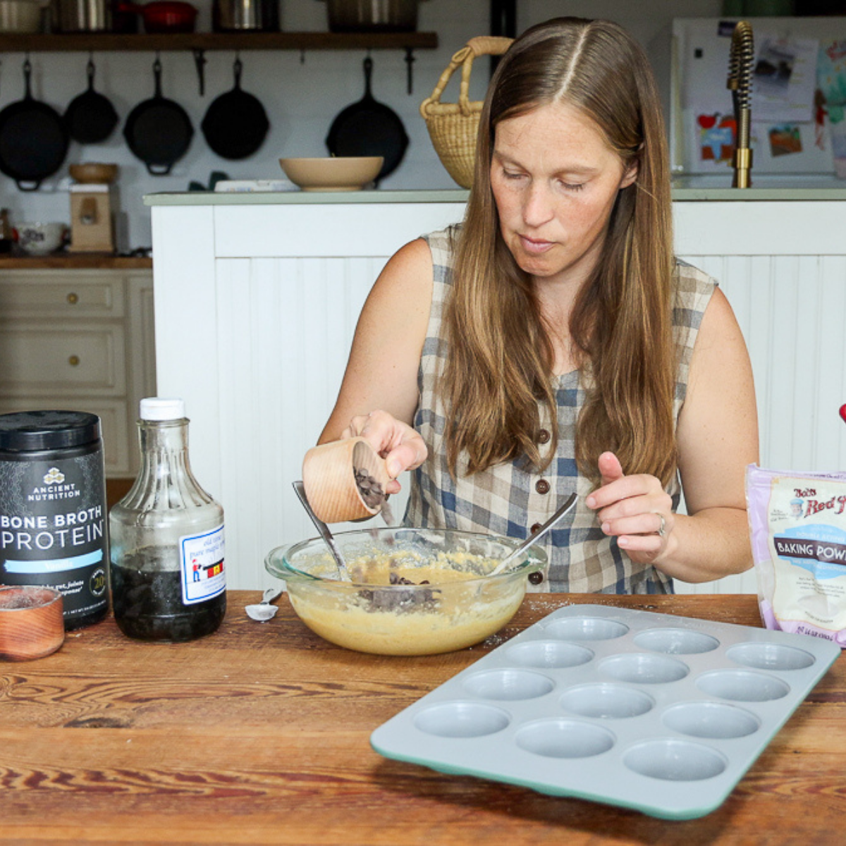 adding chocolate chips to banana protein muffins batter