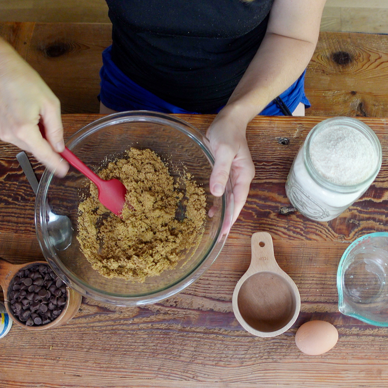 mixing coconut oil and sugar