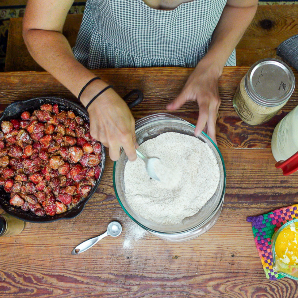 mixing dry ingredients for quick strawberry cobbler