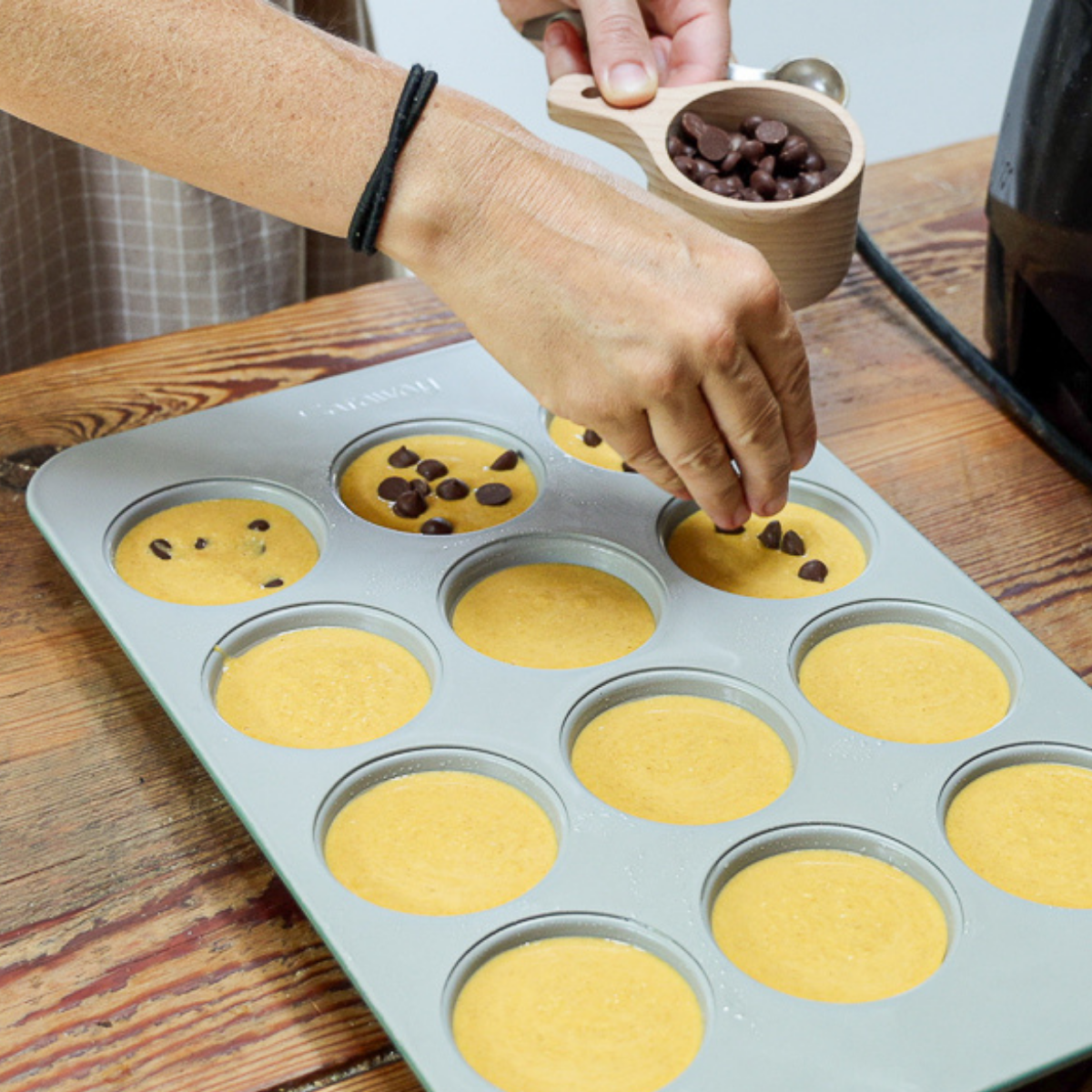topping oatmeal pumpkin muffins with chocolate chips